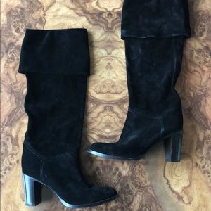 Heeled suede boots.